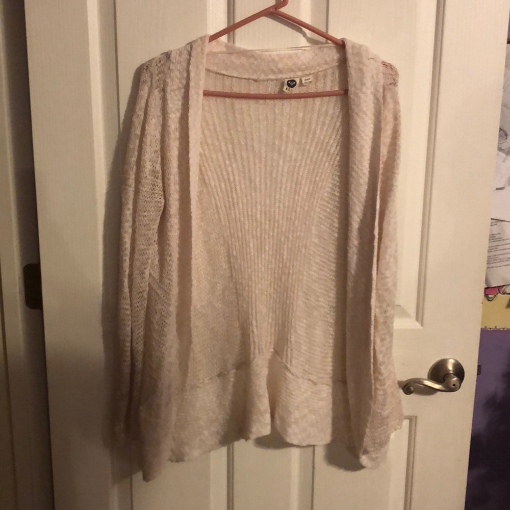 White cardigan.
